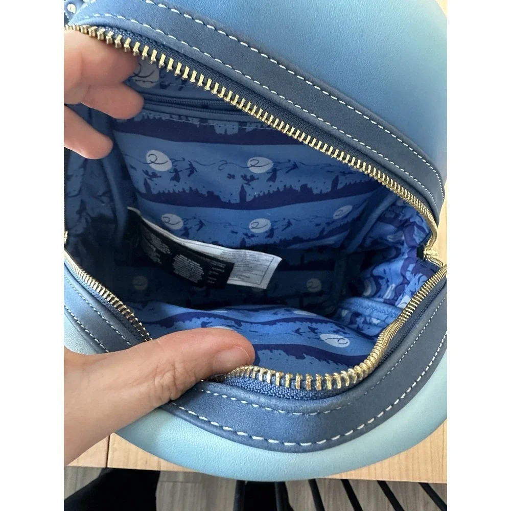 Loungefly Disney Peter Pan Second Star Glow In The Dark Mini Backpack Blue